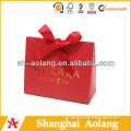 Red rigid paper purse totes with red ribbon knot China wholesales